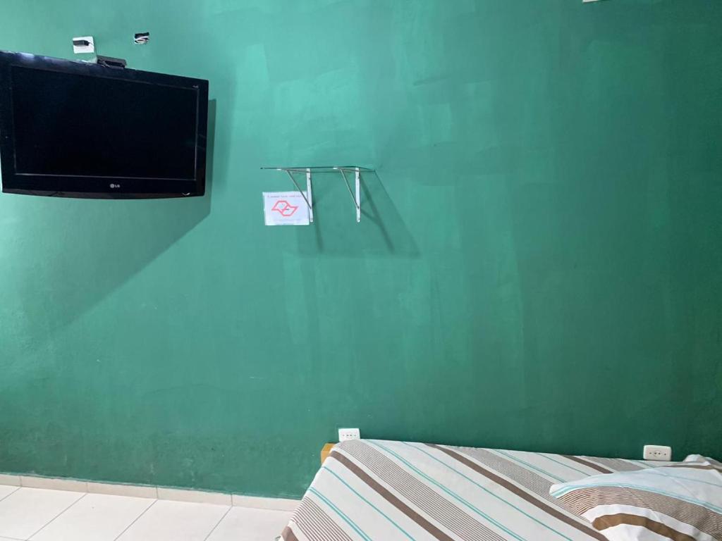 Μια τηλεόραση ή/και κέντρο ψυχαγωγίας στο Hotel Vila de São Vicente