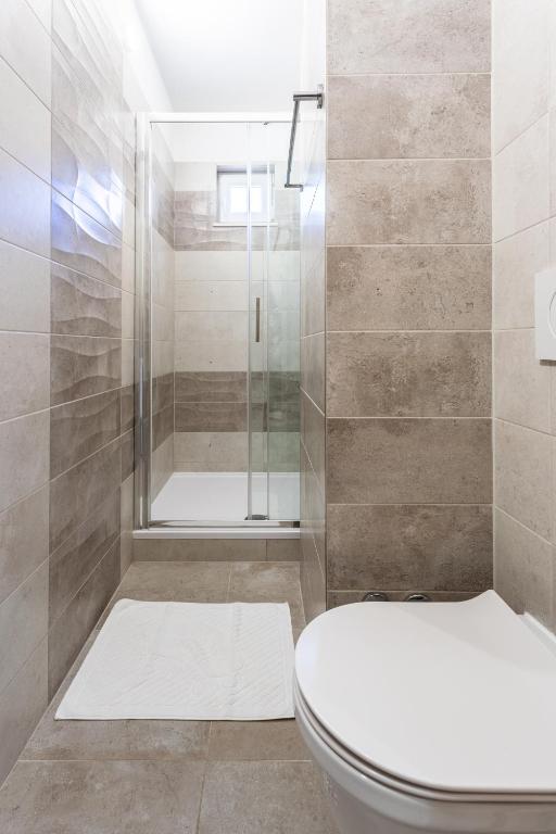 Kúpeľňa v ubytovaní Villa Ana perfect for families with kids and groups,House with heated Pool