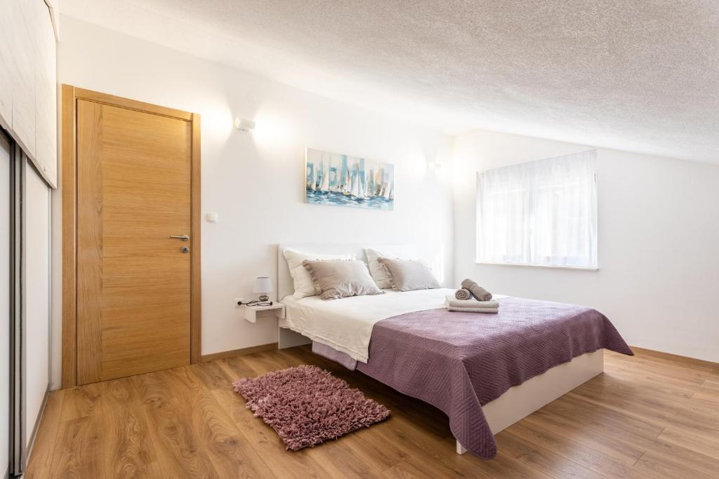 Posteľ alebo postele v izbe v ubytovaní Villa Ana perfect for families with kids and groups,House with heated Pool