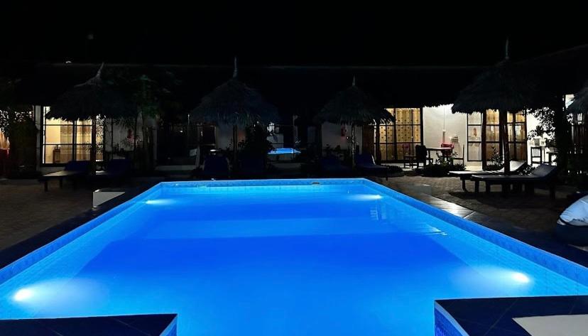 Bazén v ubytování Amani Hotel Paje nebo v jeho okolí