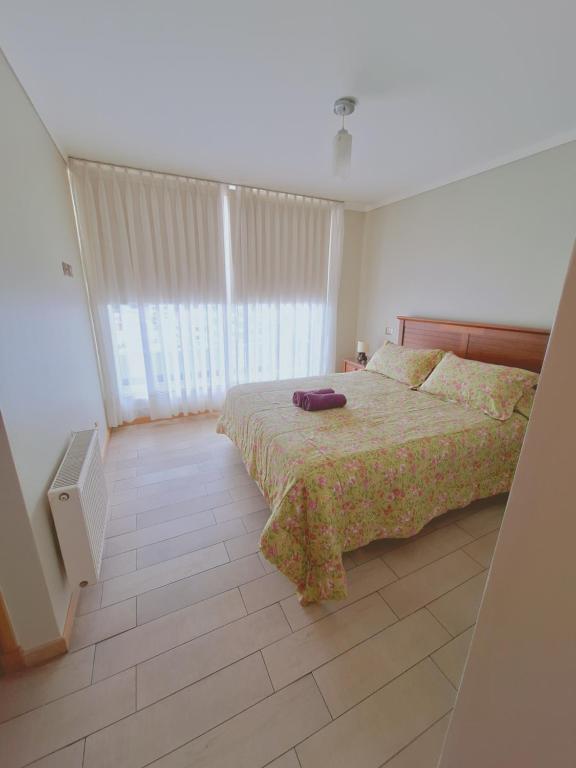 Cama o camas de una habitación en Departamento Bernal Via Viana