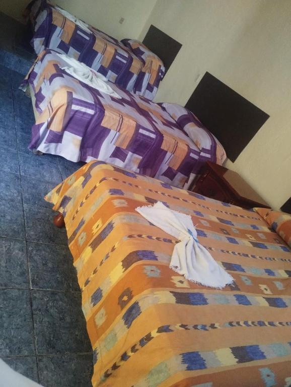 Postel nebo postele na pokoji v ubytování Hotel Puerto Real-Minatitlán