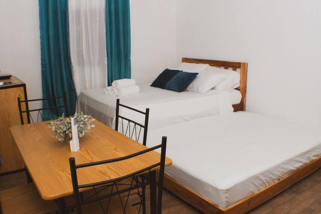 Postel nebo postele na pokoji v ubytování Salamanca Loft