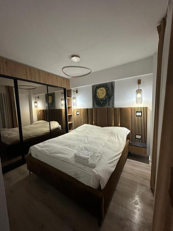 Ένα ή περισσότερα κρεβάτια σε δωμάτιο στο Q Business Apartment