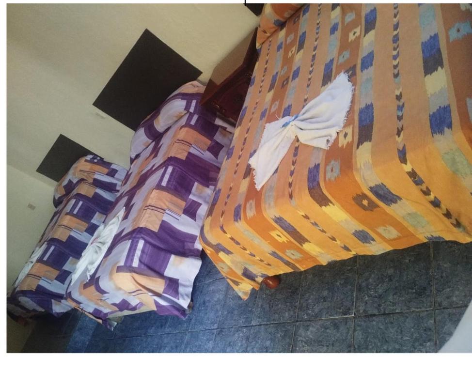 Postel nebo postele na pokoji v ubytování Hotel Puerto Real-Minatitlán