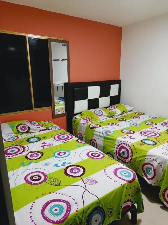 Postel nebo postele na pokoji v ubytování HOTEL VITRU