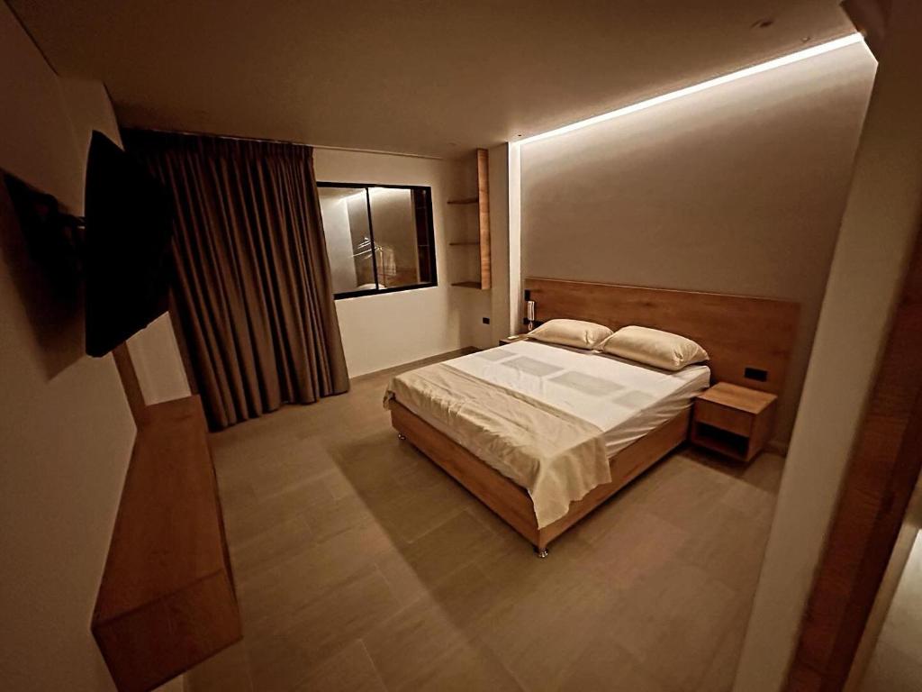 Postel nebo postele na pokoji v ubytování Hotel La Casona San Sebastian