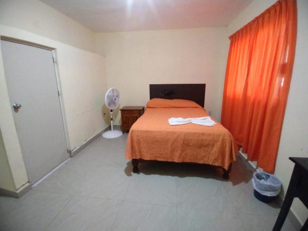 Postel nebo postele na pokoji v ubytování Hotel Puerto Real-Minatitlán