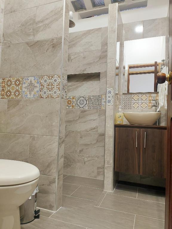 Koupelna v ubytování Volarte Hostal
