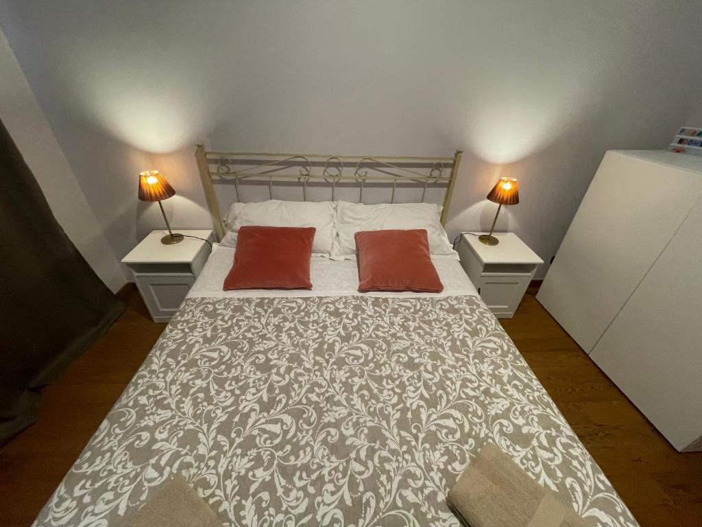 Postel nebo postele na pokoji v ubytování Paradise Rooms - Brignole Station