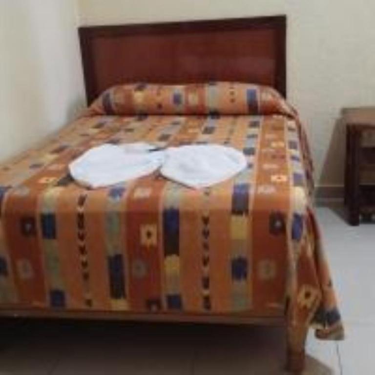 Postel nebo postele na pokoji v ubytování Hotel Puerto Real-Minatitlán