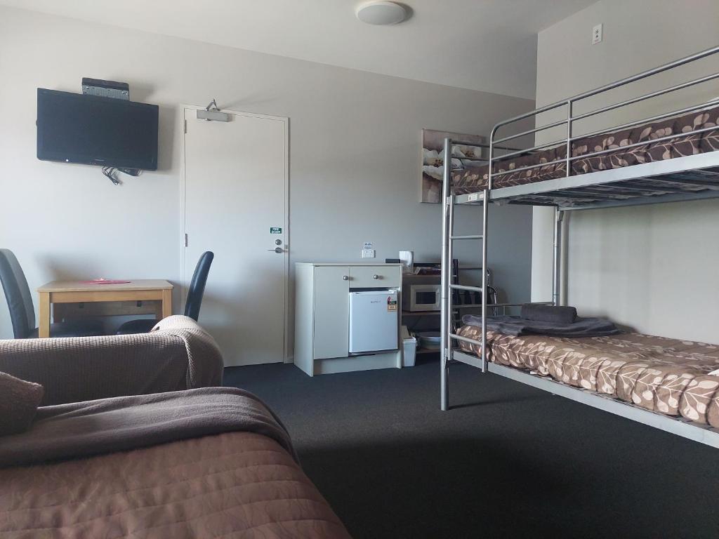 Postel nebo postele na pokoji v ubytování Northpark Motel