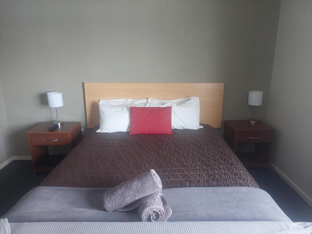 Postel nebo postele na pokoji v ubytování Northpark Motel