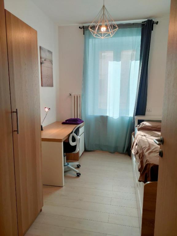 Кровать или кровати в номере Trieste LIVING
