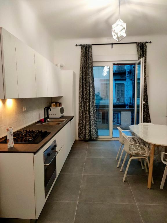 Кухня или мини-кухня в Trieste LIVING
