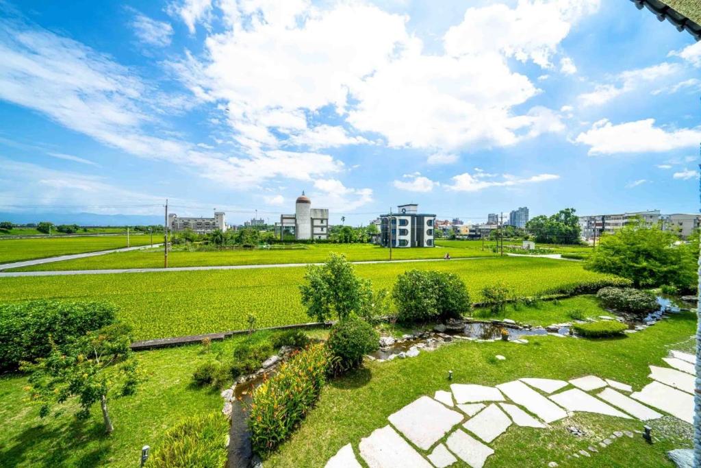 an aerial view of a park with a river at Yun Tien Feng Chuan B&amp;B in Dongshan