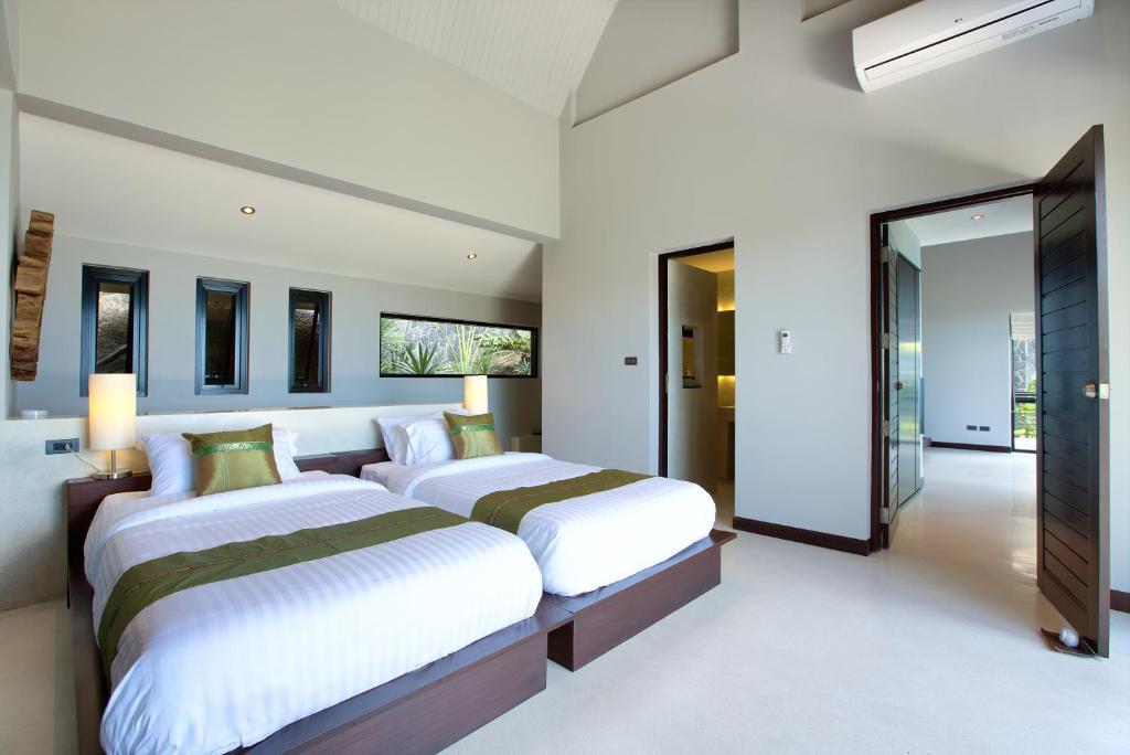 Postel nebo postele na pokoji v ubytování Moonshadow - Multiple Award Winning Villa in Chaweng Noi