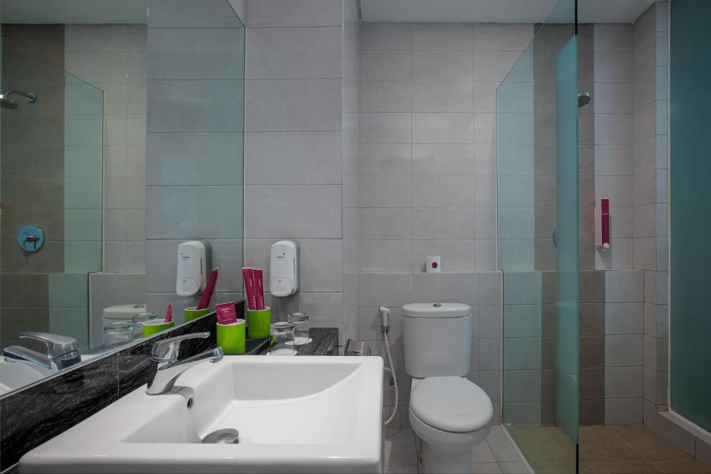 Koupelna v ubytování favehotel Sidoarjo