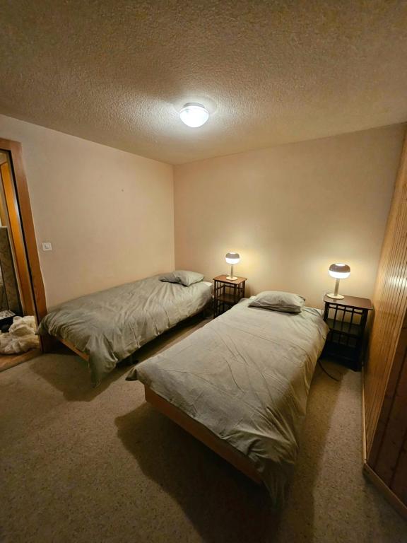 Postel nebo postele na pokoji v ubytování Verbier Appartement Andrea