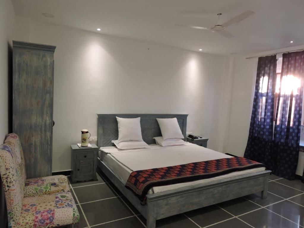 Cama o camas de una habitación en Hotel Mewari Villa