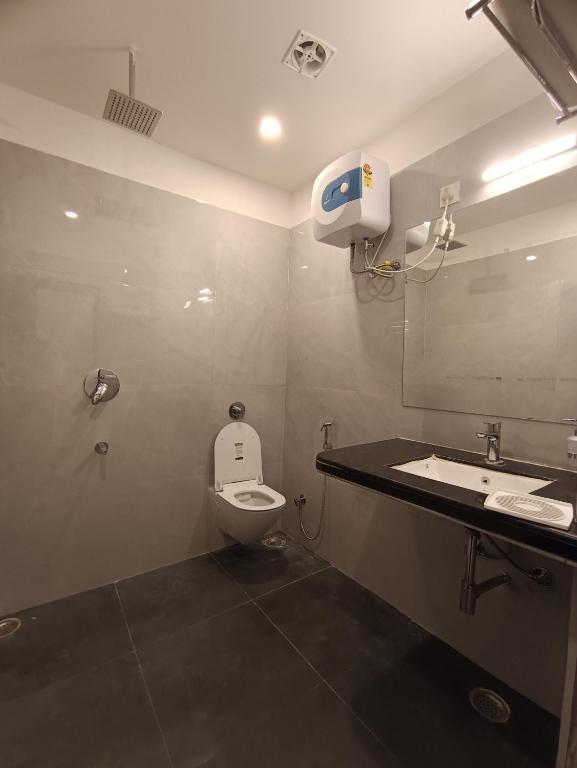 Un baño de Hotel Mewari Villa