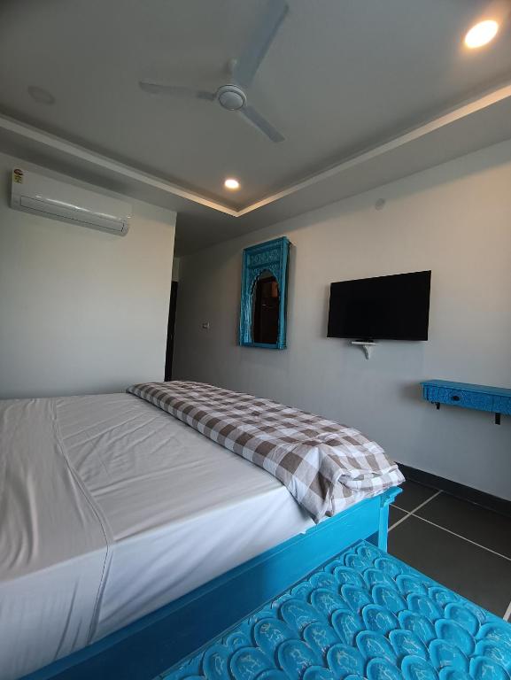 Cama o camas de una habitación en Hotel Mewari Villa