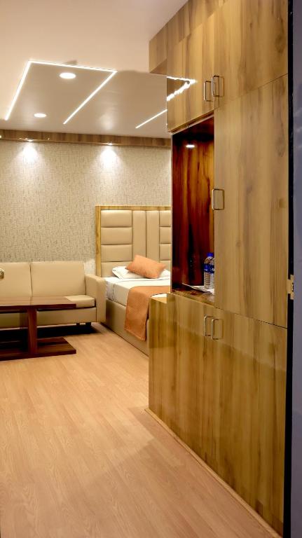 Postel nebo postele na pokoji v ubytování Hotel Executive Tower