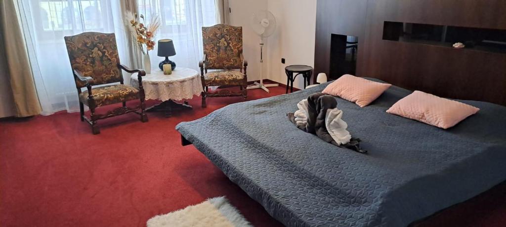 Postel nebo postele na pokoji v ubytování Penzion Adler