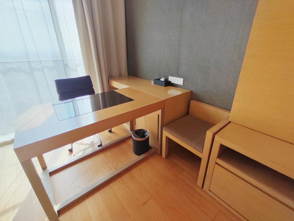 Posezení v ubytování Snug Gaokong Jiangjing Hotel