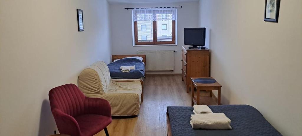 Postel nebo postele na pokoji v ubytování Penzion Adler