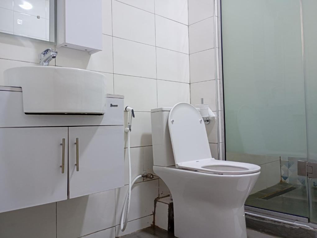 Ένα μπάνιο στο Cata Apartment Hotel And Spa
