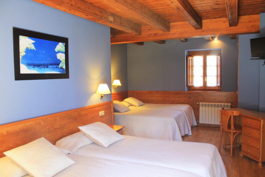 Postel nebo postele na pokoji v ubytování Cal Francès