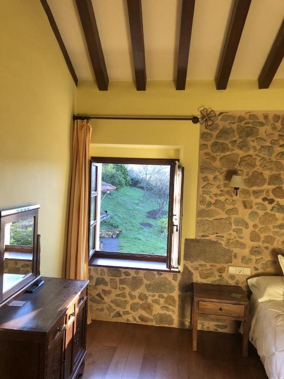 Postel nebo postele na pokoji v ubytování Casa Rural Trebol4Hojas