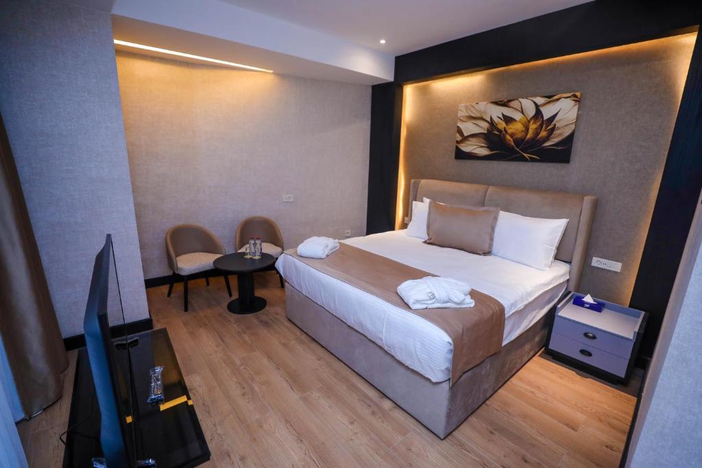 Postel nebo postele na pokoji v ubytování Arium Hotel Baku