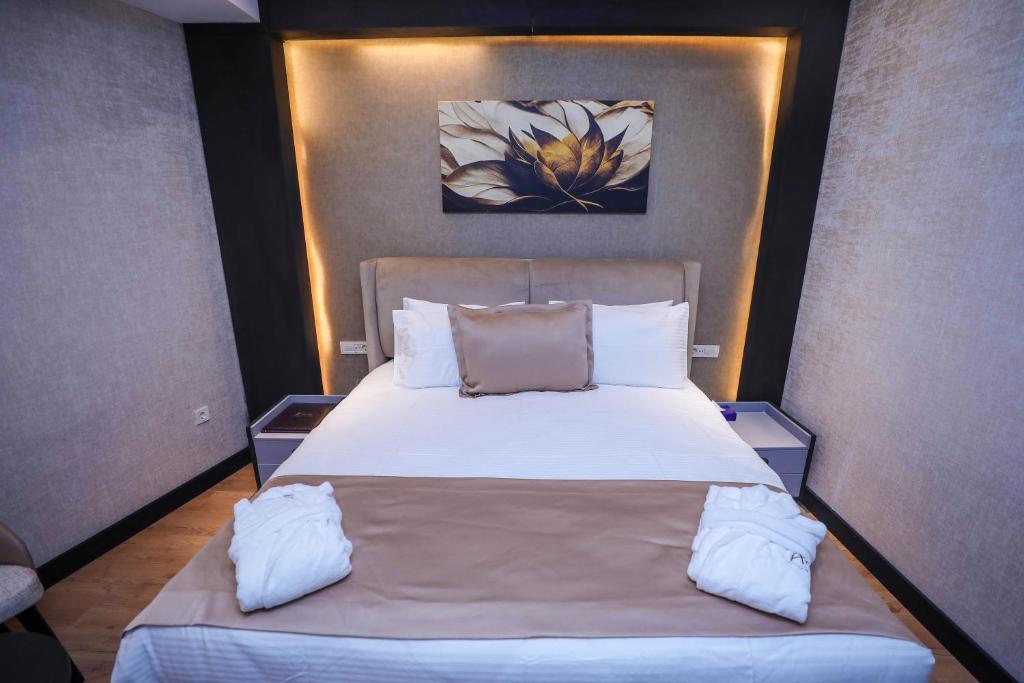 Postel nebo postele na pokoji v ubytování Arium Hotel Baku