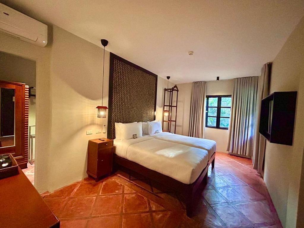 Postel nebo postele na pokoji v ubytování The Henry Resort Boracay