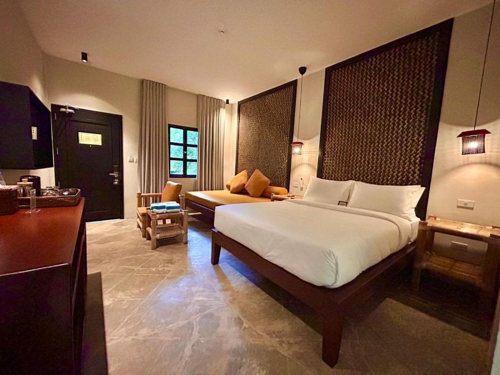 Postel nebo postele na pokoji v ubytování The Henry Resort Boracay