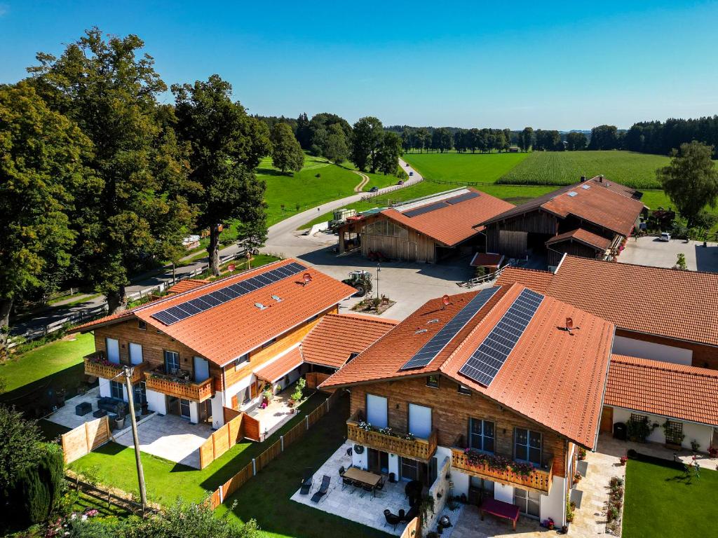 an overhead view of a house with solar panels on its roofs at Ferienwohnung Gschwandtnerhof 