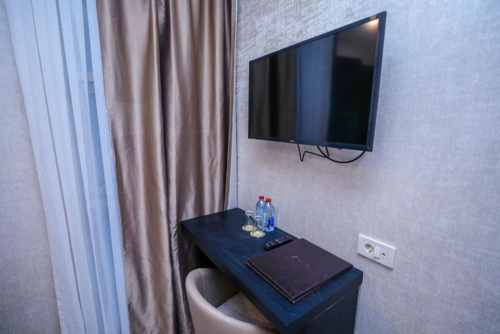 TV a/nebo společenská místnost v ubytování Arium Hotel Baku