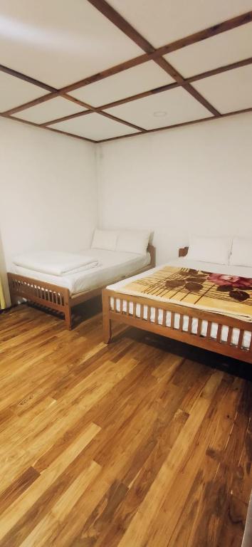Postel nebo postele na pokoji v ubytování Magnolia Hideout