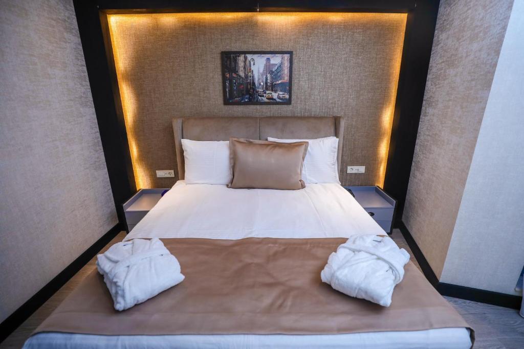 Postel nebo postele na pokoji v ubytování Arium Hotel Baku
