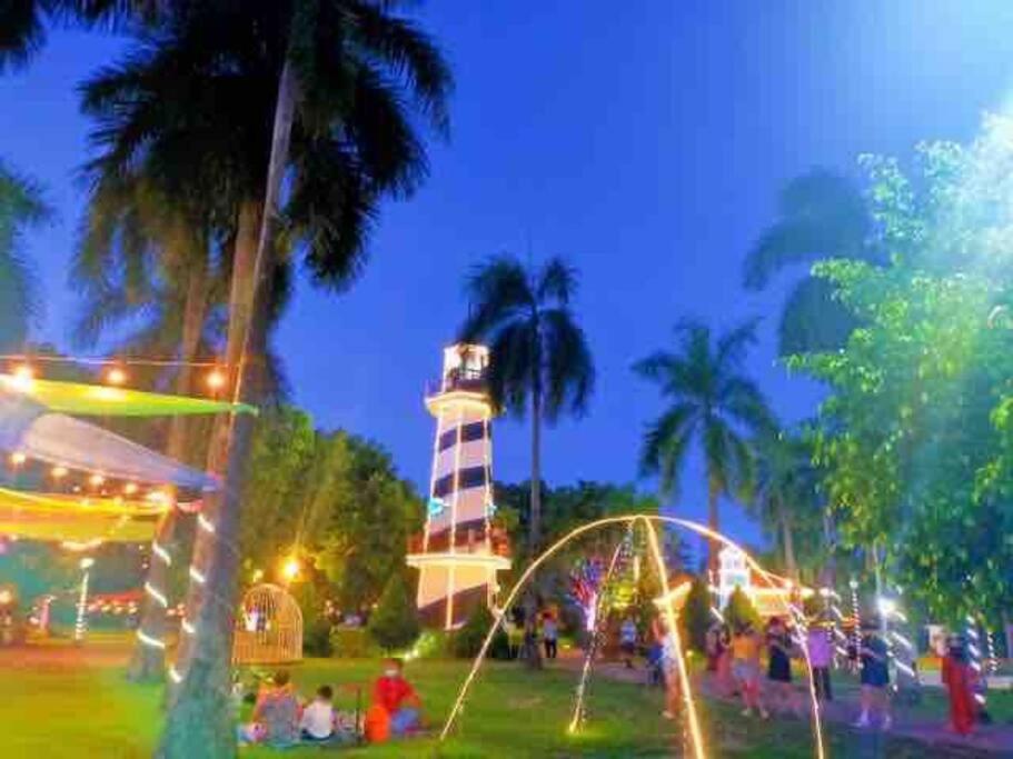 a park with a light tower and a roller coaster at Modern Home in Lakeshore Mexico, Pampanga in Mexico