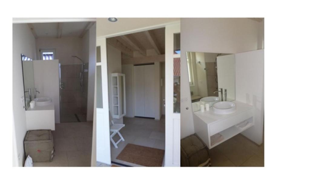 two views of a bathroom with two sinks and a shower at Ferienpark Neppermin Ferienhaus Skipper in Neppermin