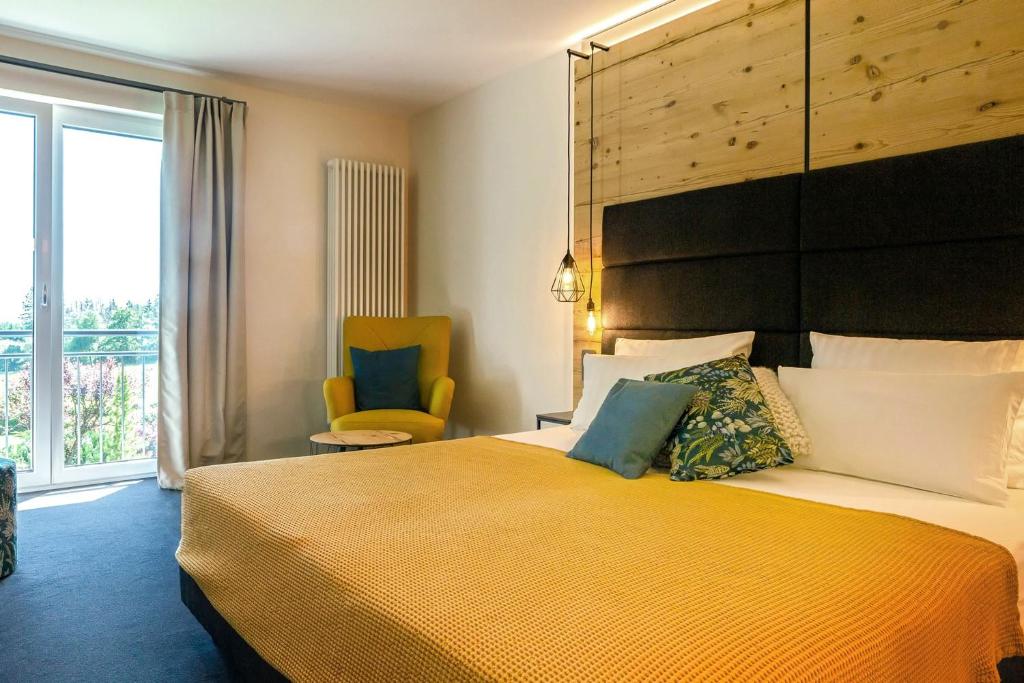 Postel nebo postele na pokoji v ubytování Hotel Wilhelmshöhe Auderath