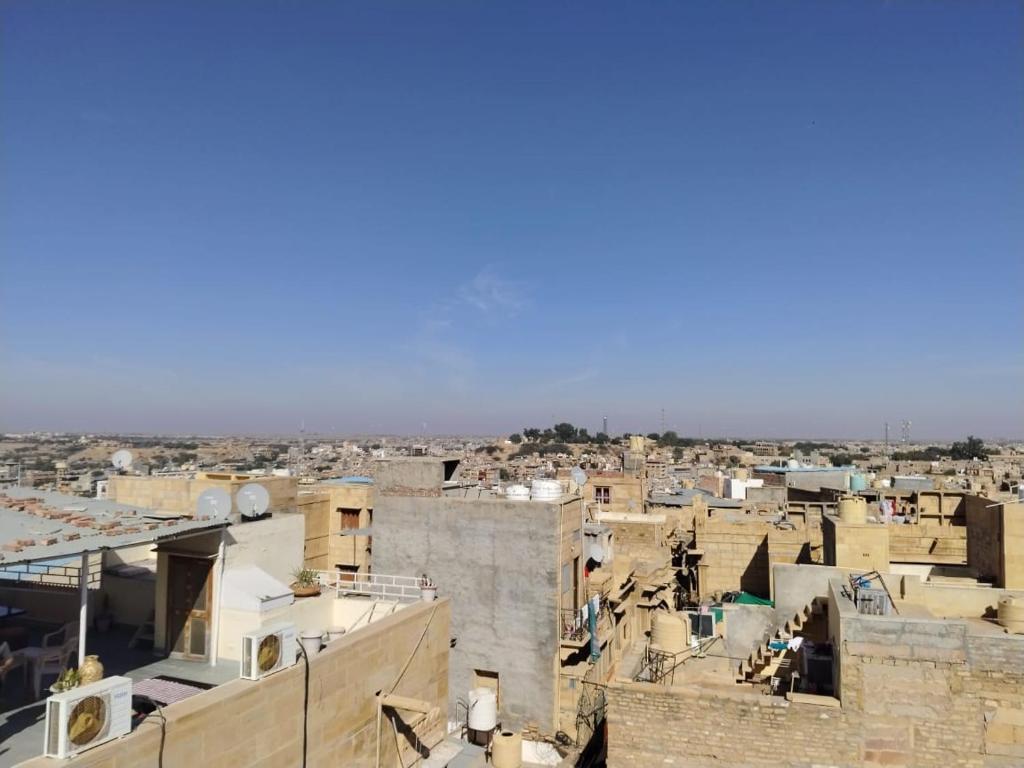 an aerial view of a city with buildings at Stay With Us Home Stay in Jaisalmer