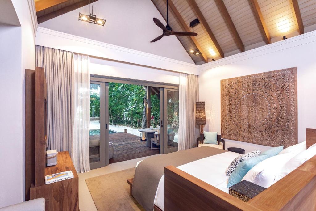 Postel nebo postele na pokoji v ubytování Vakkaru Maldives - 30 percent off on seaplane transfers for stays until 19 Dec 2025