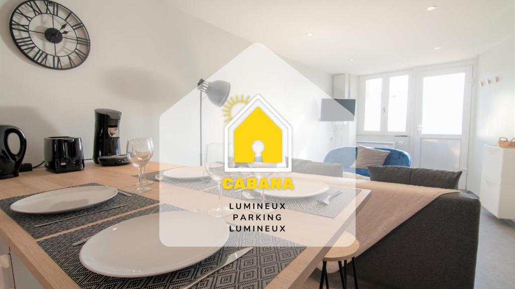 a room with a table with a dining room at CABANA & Duplex - Cluny à 20 minutes in Saint-Bonnet-de-Joux