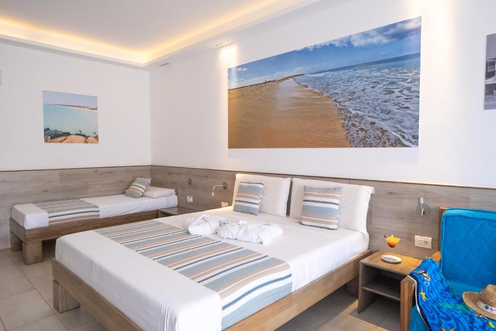 Postel nebo postele na pokoji v ubytování Sobrado Boutique Hotel