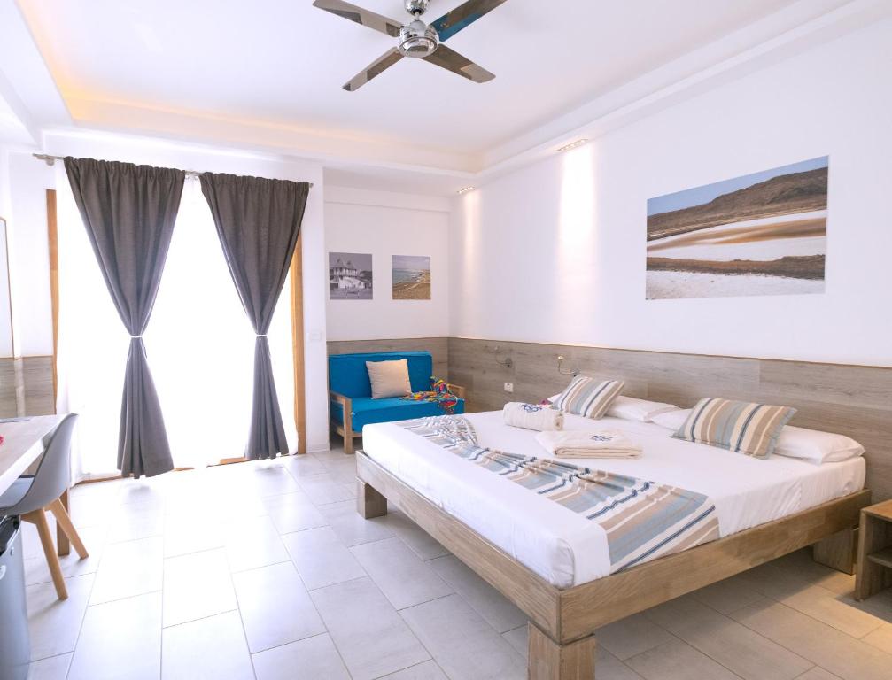 Postel nebo postele na pokoji v ubytování Sobrado Boutique Hotel