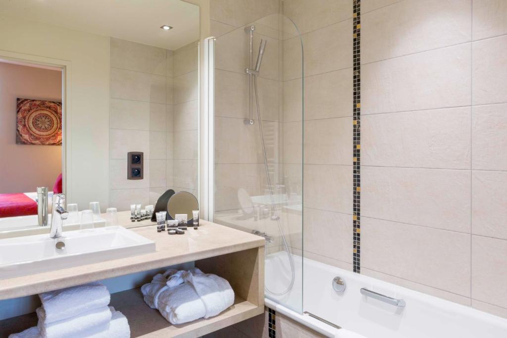 Koupelna v ubytování Best Western Plus Hôtel Escapade Senlis
